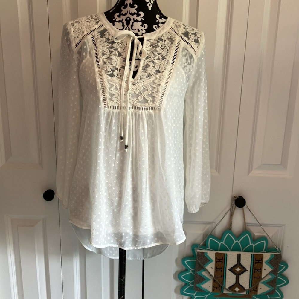 Shear cream dotted boho style blouse with V open neck and tie with lace detail